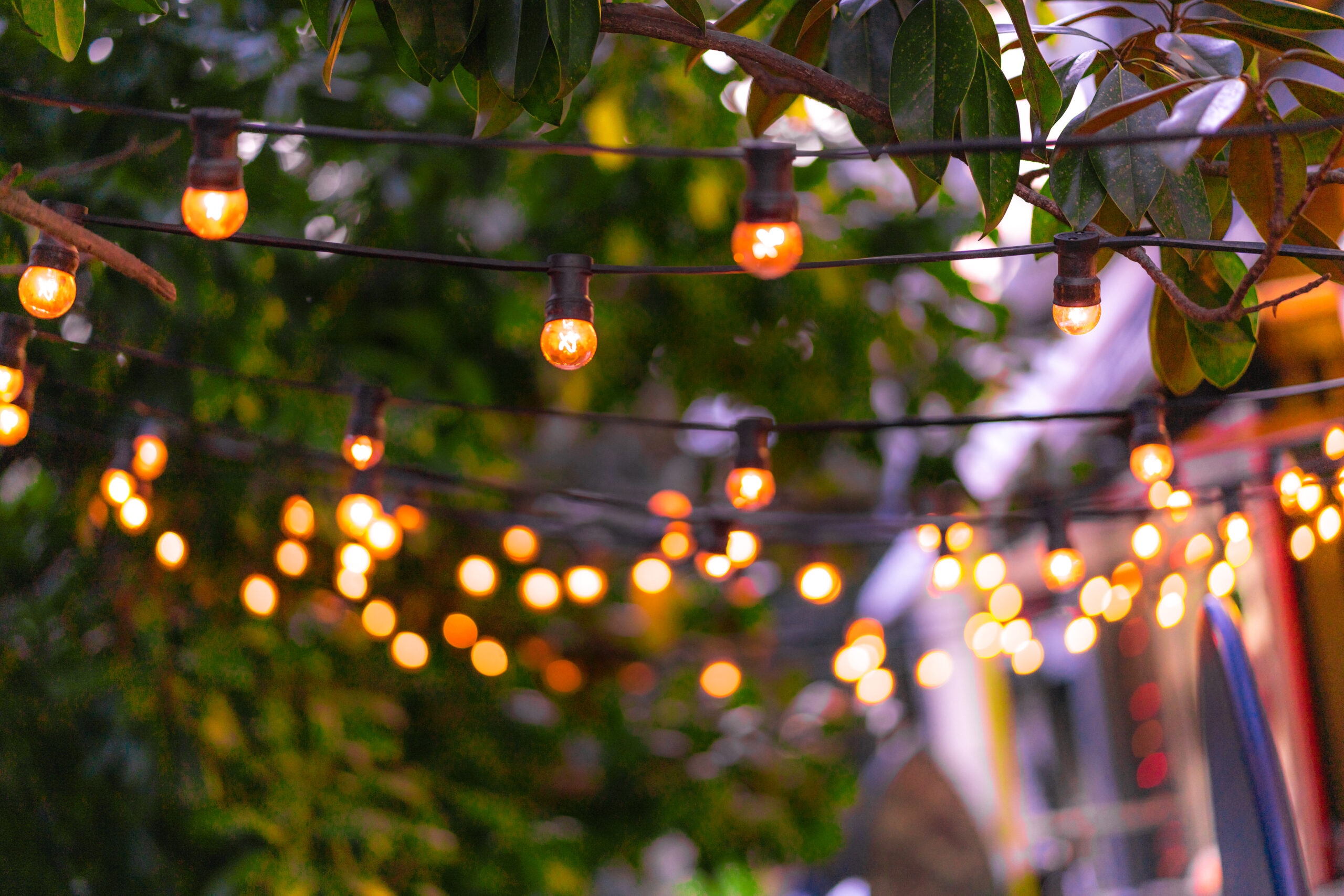 Decoration of the street with vintage Edison incandescent bulbs garland